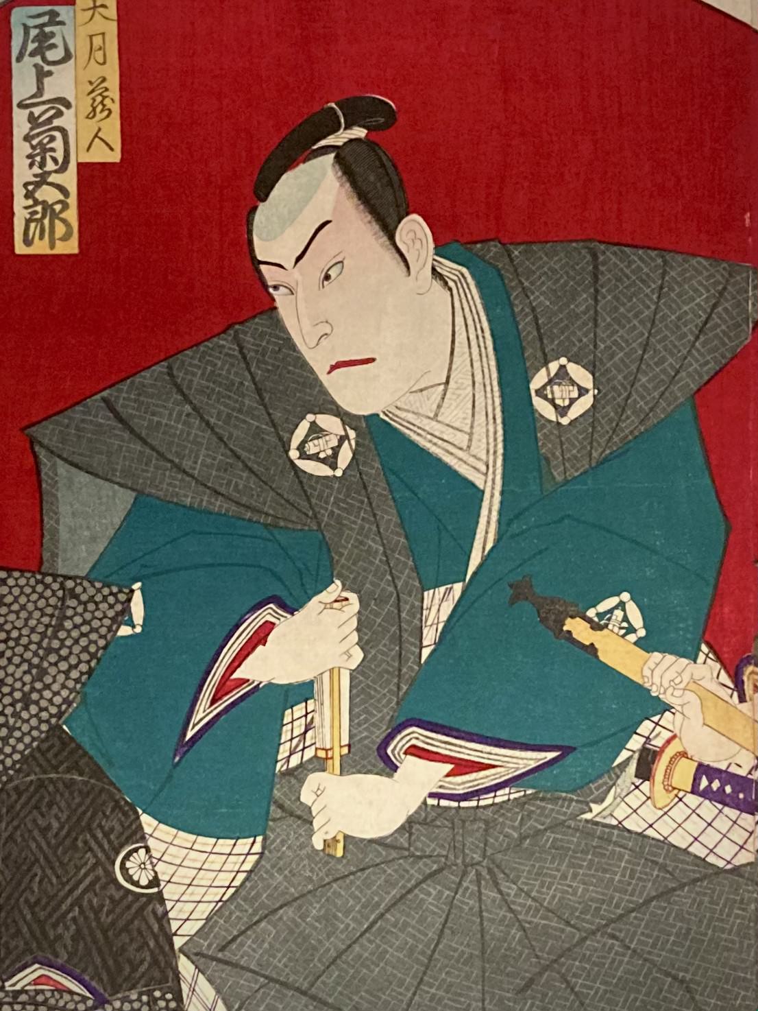 Close-up of kabuki actor in ornate kimono with intense expression from Kunichika’s Japanese woodblock triptych, highlighting Edo-style textile detail and theatrical emotion.