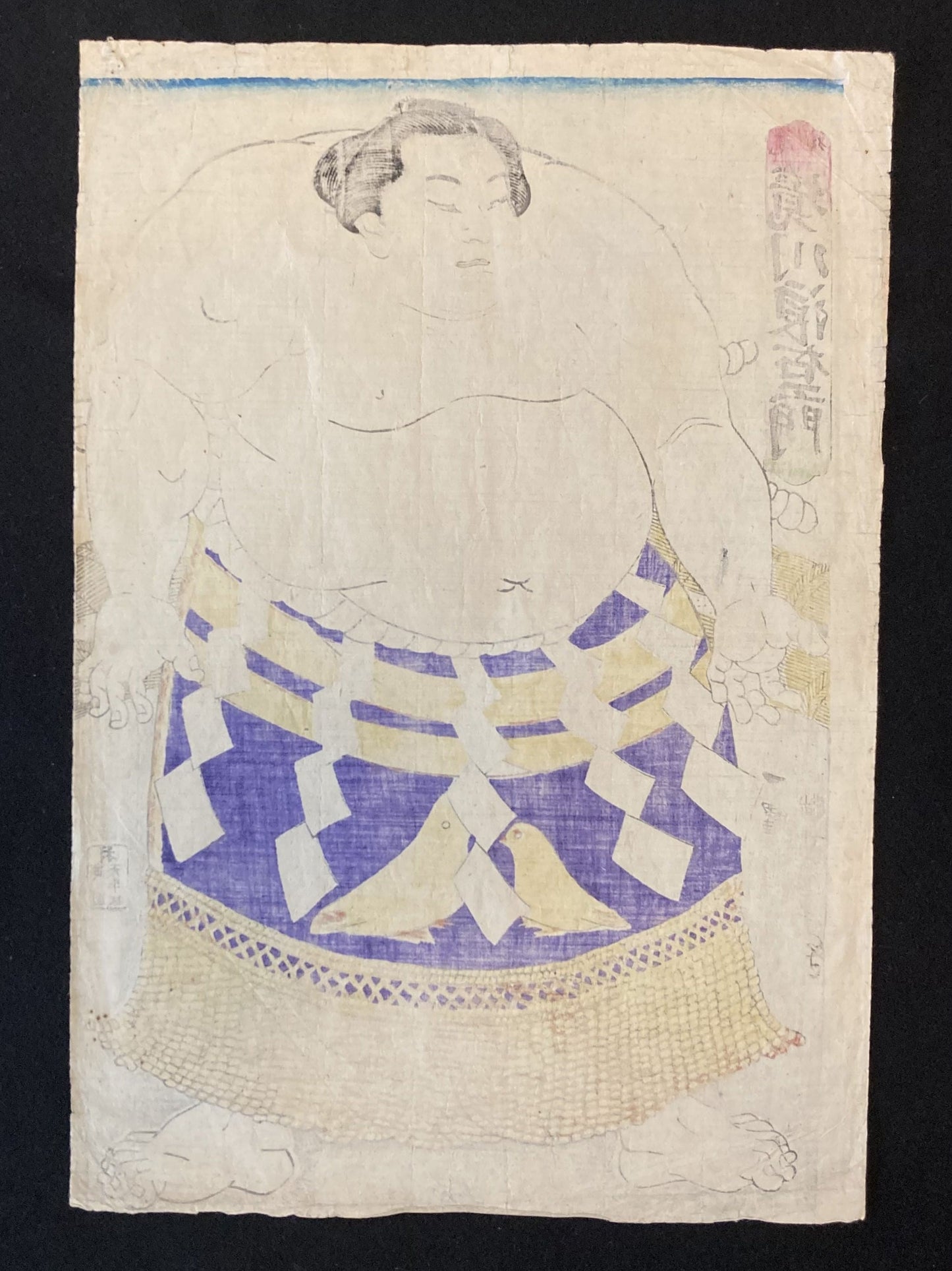 Back of Kuniteru’s sumo wrestler print on textured washi paper, showing faint ink bleed and structure typical of authentic Japanese prints.