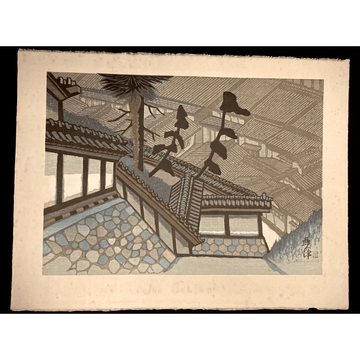 Japanese print by Junichiro Sekino, high-angle townscape from 1974 showing traditional rooftops, stonework, and evergreen trees in a muted gray-blue palette.