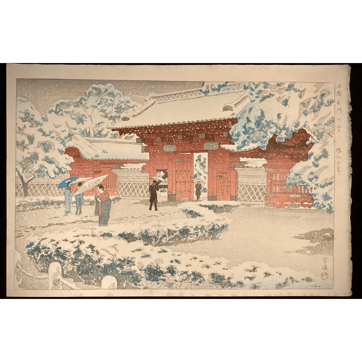 Snowy Hongo gate scene by Kasamatsu Shiro, Japanese art print from the 1930s featuring red gate, snow-covered trees, and umbrella-carrying figures.