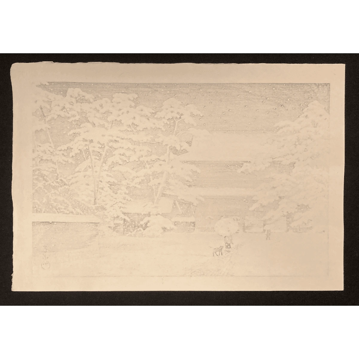 Back of Kawase Hasui’s snow-covered Zojoji Temple print, with traditional washi paper and soft pigment bleed-through typical of Japanese prints.