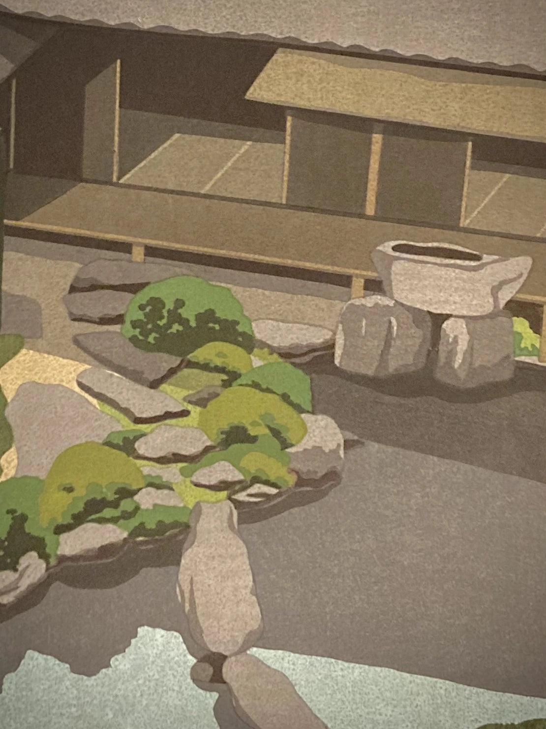 Close-up of Masao Ido’s Chijakiun woodblock print showing pond reflections, rocks, and foliage detail, modern Japanese landscape art.