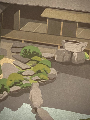 Close-up of Masao Ido’s Chijakiun woodblock print showing pond reflections, rocks, and foliage detail, modern Japanese landscape art.