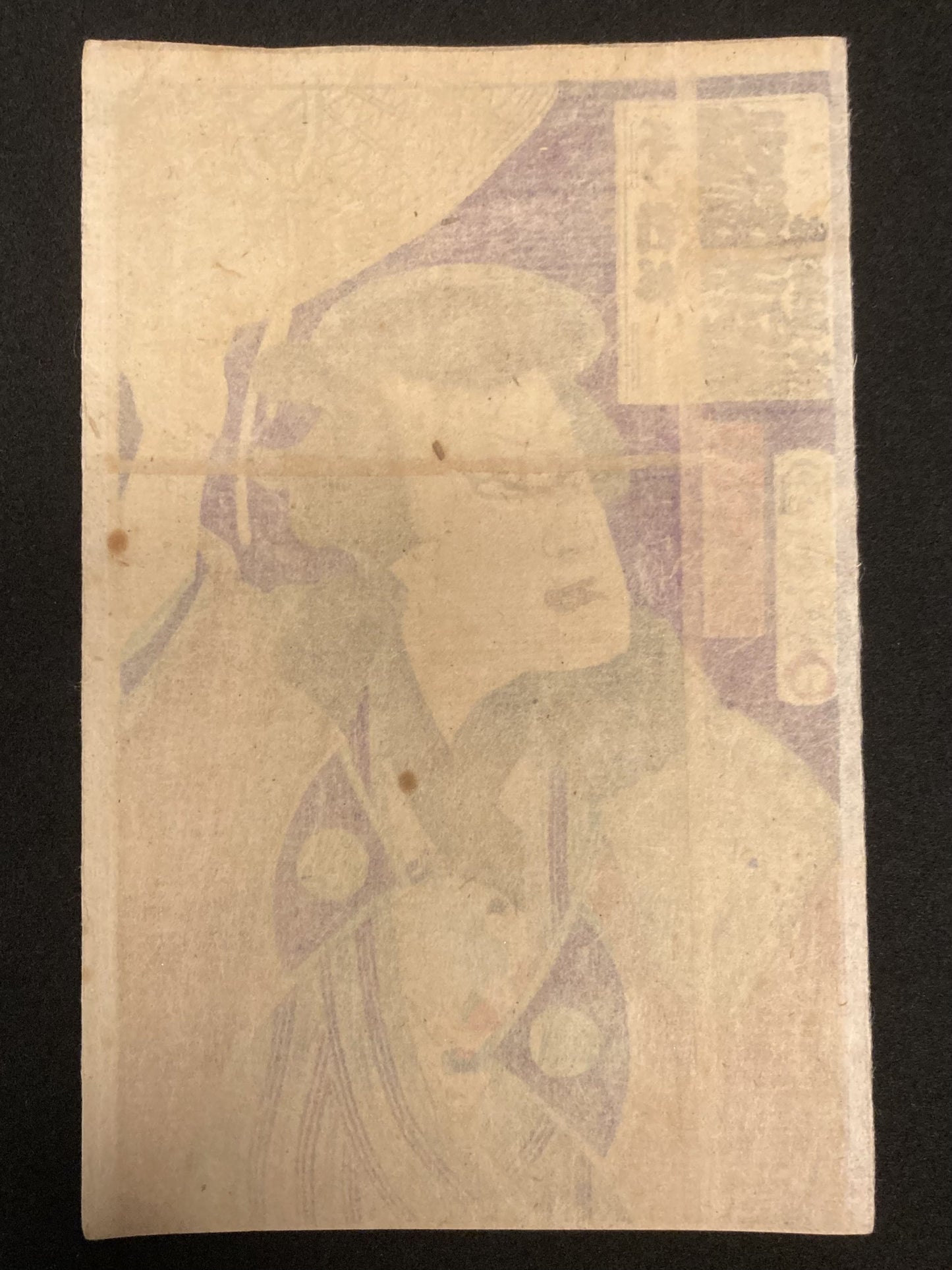 Reverse side of the woodblock print with aged washi paper, minor foxing, and possible publisher or censor seals characteristic of Meiji-era prints.