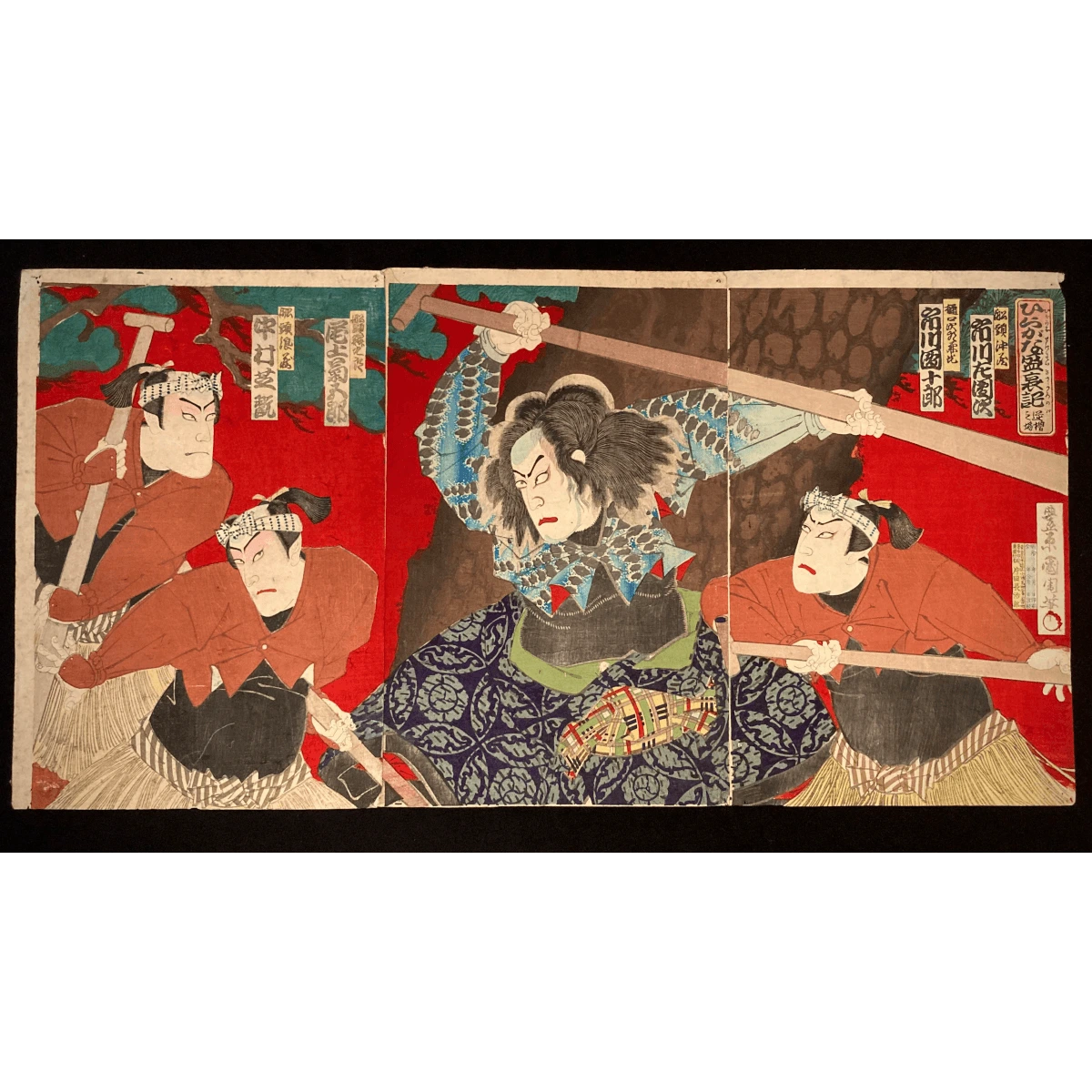 Dynamic Japanese woodblock print triptych depicting a Kabuki battle scene with samurai in vibrant costumes and expressive poses, set against a bold red background.