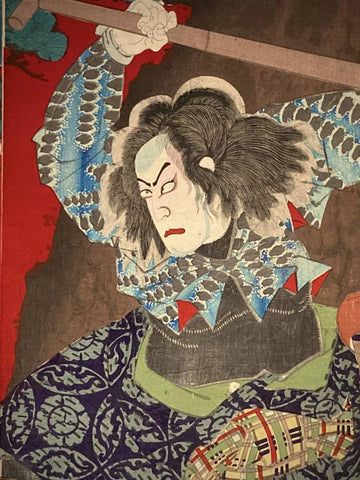 Close-up of Japanese art print showing a Kabuki actor’s fierce expression and ornate kimono pattern, highlighting the drama and detail of Edo-era woodblock technique.
