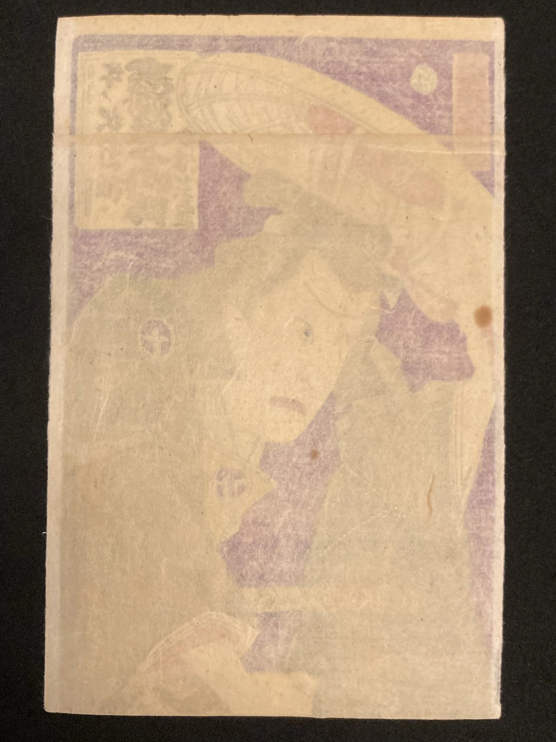 Reverse side of a Japanese print on washi paper, showing natural ink bleed-through from the woodblock design and soft paper texture typical of handmade Japanese artwork.