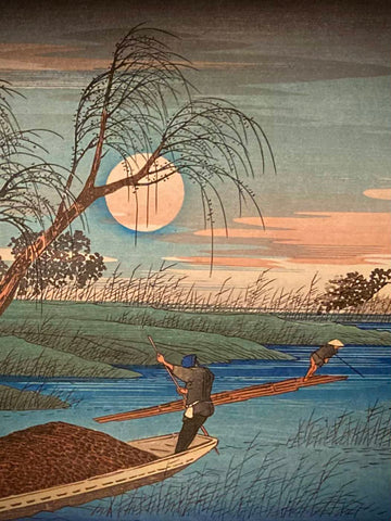 Close-up of Japanese art print showing delicate willow branches and moonlit water textures, highlighting fine linework and color gradients in the river scene.
