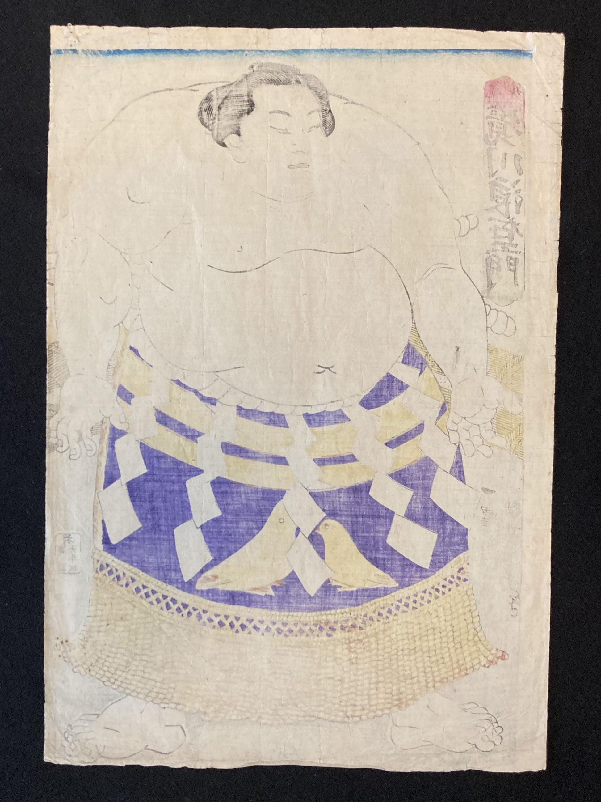 Back of Kuniteru’s sumo wrestler print on textured washi paper, showing faint ink bleed and structure typical of authentic Japanese prints.